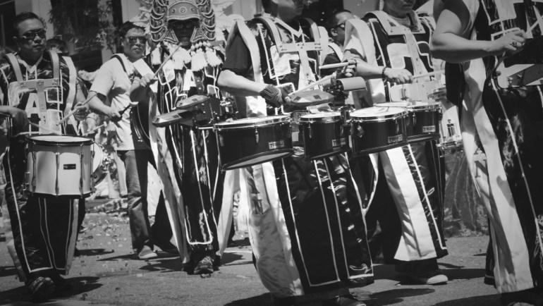 tribal marchers and drummers